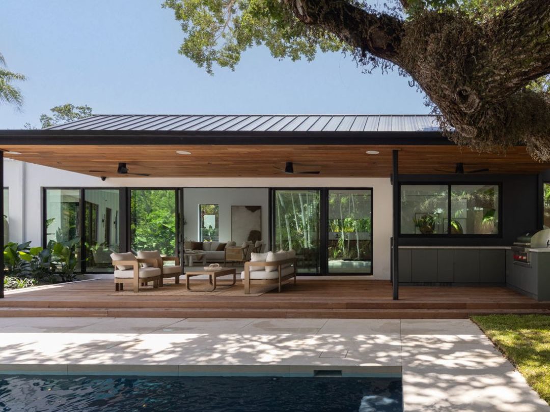 Oak House — rear elevation and pool beneath the canopy live oak